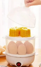 Load image into Gallery viewer, Electric egg cooker on kitchen counter