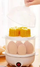 Load image into Gallery viewer, Electric egg cooker on kitchen counter
